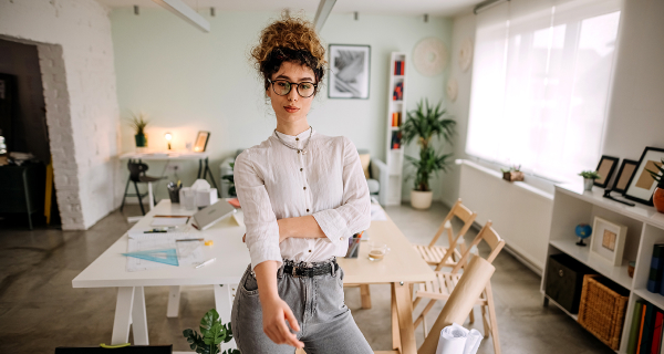 Photo of woman in a well-lit creative space
